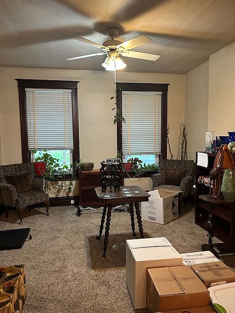 Looking through columns from Dining Room into spacious Living Room.