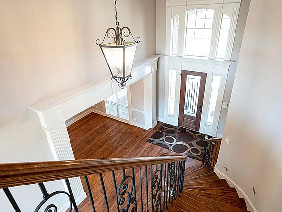 Upstairs looking down at entrance of the house.