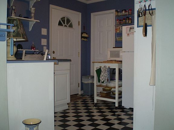 Kitchen entrance to garage conversion.
