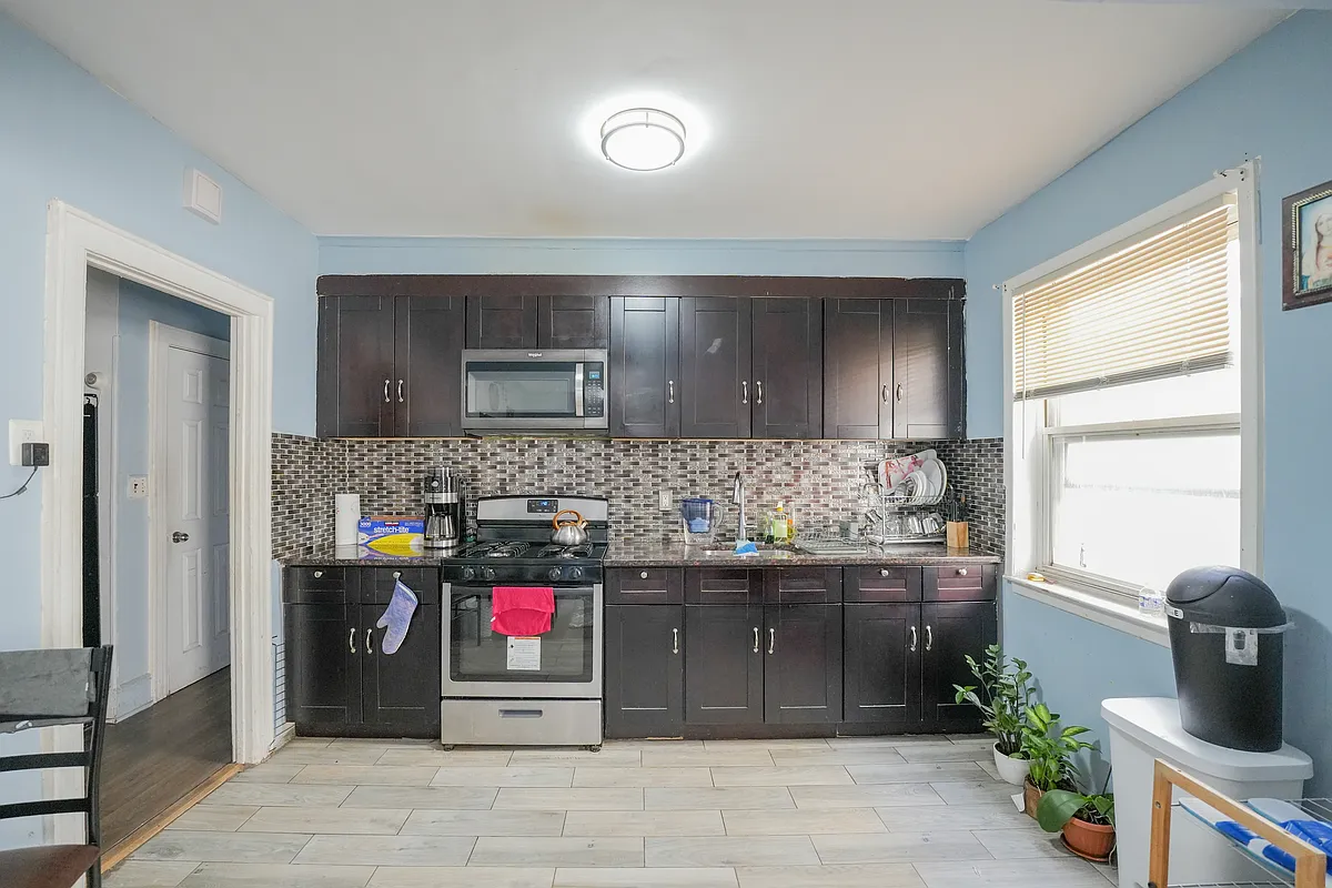 Building Photo - 61-67 56th St #1