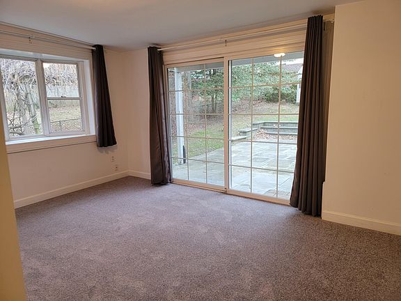 The fully finished bonus room in the back has new carpet and is a great space for a TV Room, play room, office, or home gym.