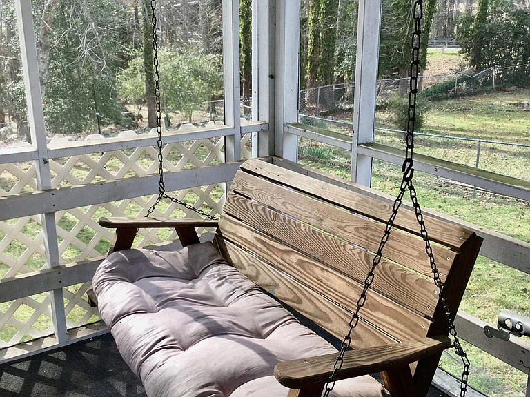 Swing on screen porch