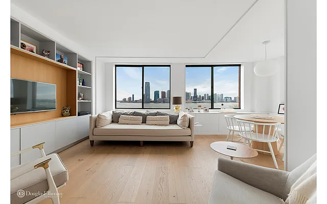 Sold by Douglas Elliman | media 18