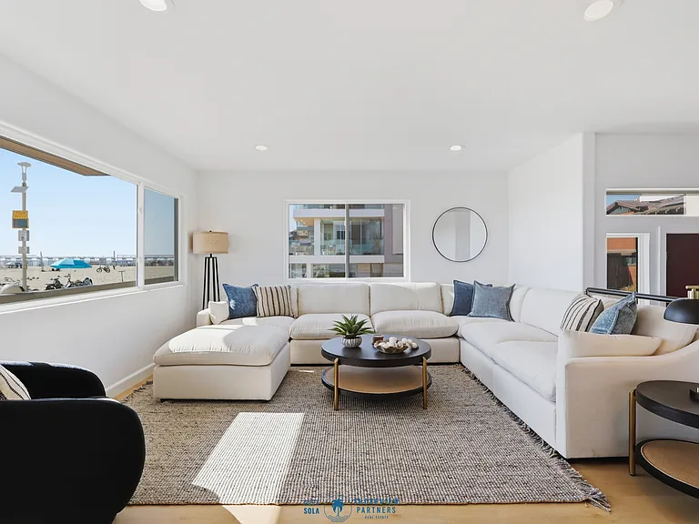 First level offers working and lounge area with full bathroom and bar.