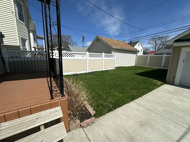 Private fenced backyard offering plenty of room to relax or entertain outdoors.