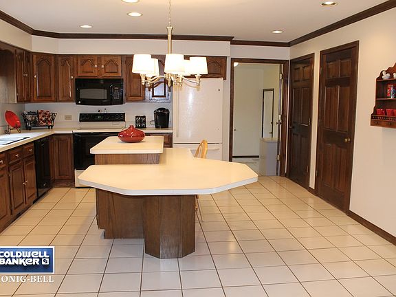 Enormous Ktichen with Island and 2 pantries.