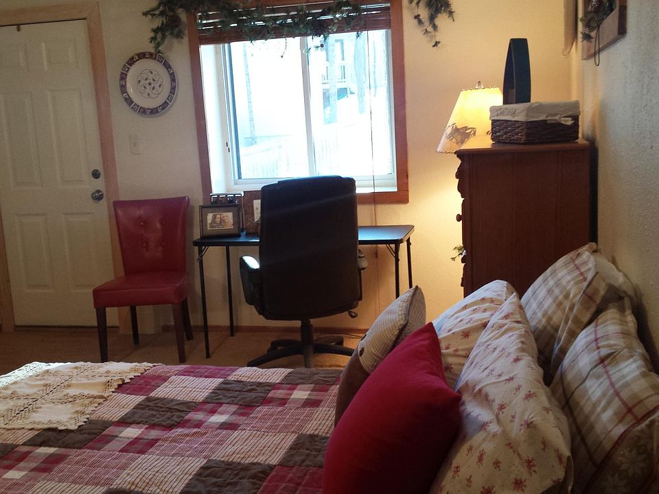 Cozy and most of all safe! Very private. The entrance way into the ground level apt. The door opens out onto a large patio facing the woods.
