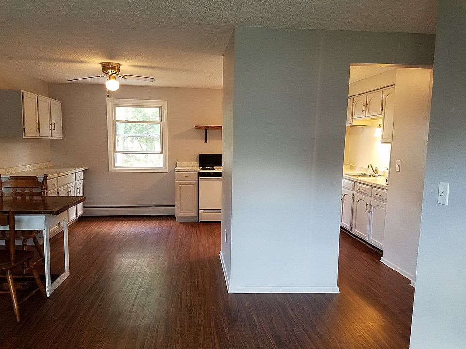 Living Room view into Dining area and Kitchen