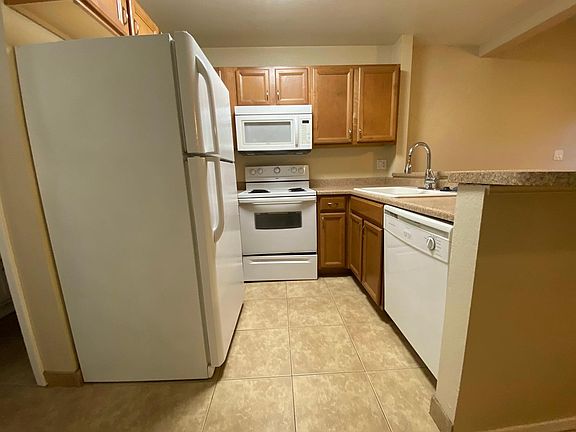 Kitchen includes refrigerator