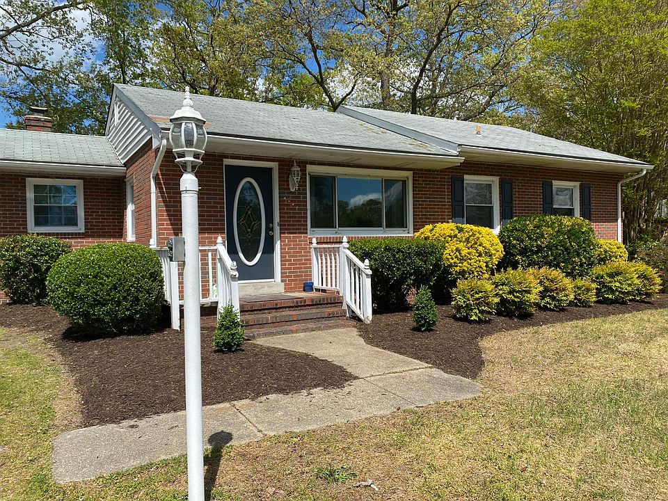 Front view, well landscaped, all brick & energy efficient replacement windows = low Dominion bills!