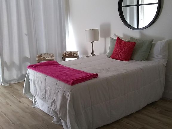 Master Bedroom with private patio attached and master bath, and a huge walk in closet. Room for a California King, Dresser, Desk, and Lazy Boy chair! Lots of light :)