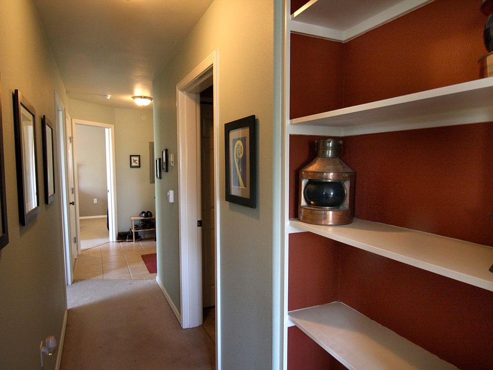 Main hallway, fresh colors, built-in bookshelf