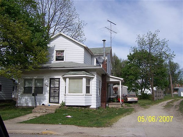 This is a very large house with new windows and corn stove!