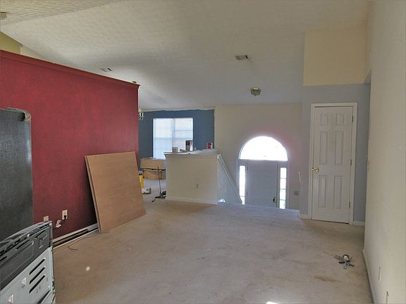Living/Dining Area and Front Door