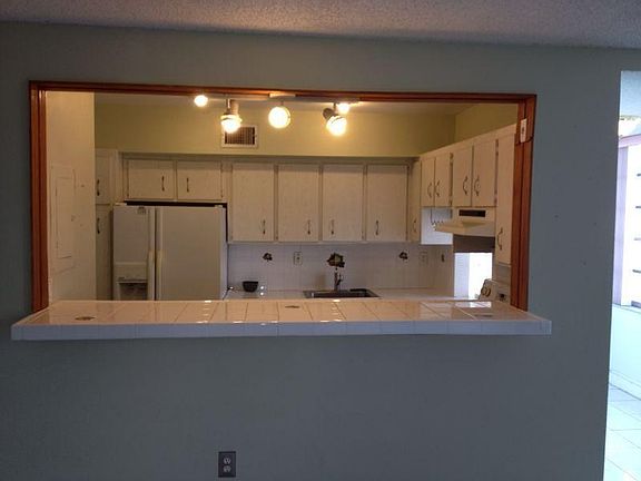 2nd image of 250 180th Dr APT 153
