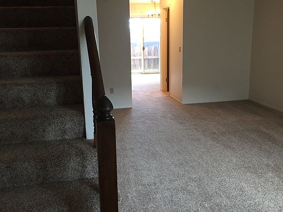 Living room with stairs up to bedrooms