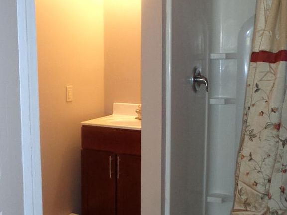 Bath w/ ceramic tile and Stall Shower