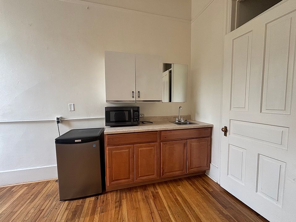 Kitchenette and door to private bathroom.