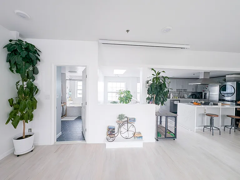 view from lounging area into kitchen