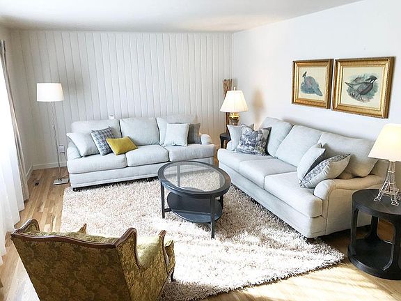 Fresh paint, refinished hardwood floor, sunny front room.