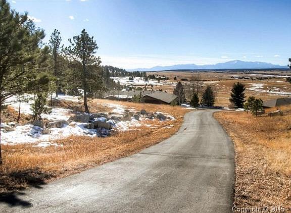 The top of the driveway (summer) shows how the land opens from t