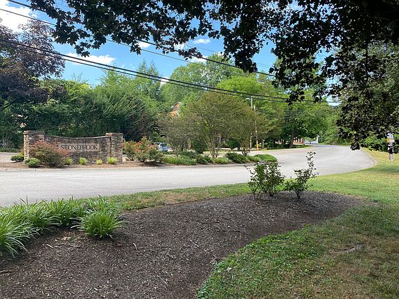 Entrance to Stonebrook Drive. Apartment complex is to the left.