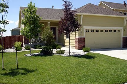 lush lawn, corner lot