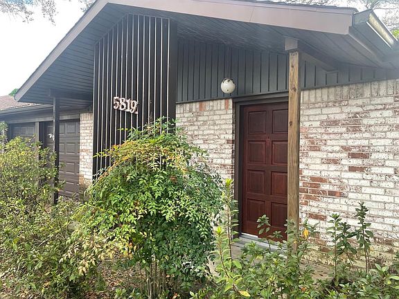 Front porch has mid-century modern details.