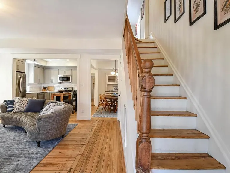 Restored original staircase and hardwood floors