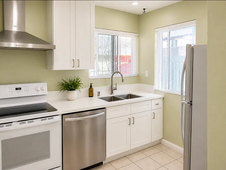 BRAND NEW remodeled kitchen, new countertops, cabinets, sink, faucet, blinds and appliances