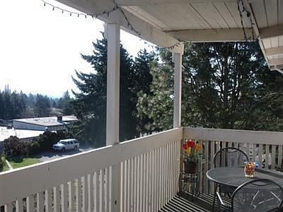 Enjoy Easterly vistas and even peek Mountain views from this gorgeous top, corner unit with Parisian