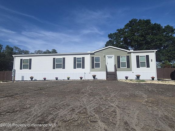 3rd image of 8128 Weeping Willow St
