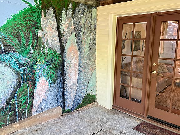 Mural of Yuba River scene by front door
