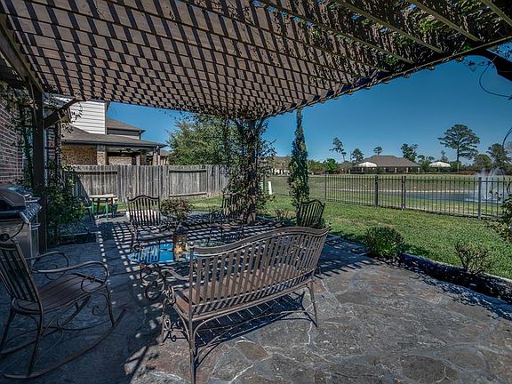 "Evarything is Awesome" Beautiful pergola and large flagstone patio to entertain or just relax and enjoy the view and tranquility.