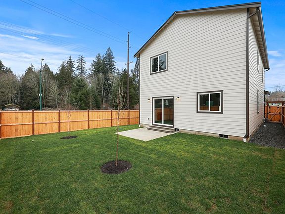 Back yard is fully fenced and spacious