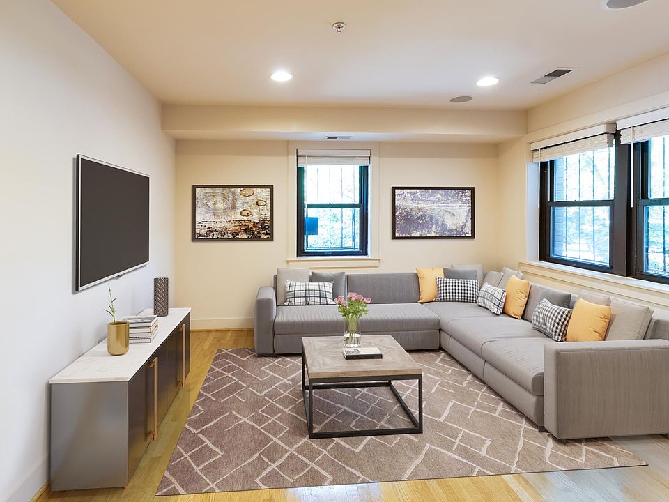 Den with large windows and great light! (Virtually staged).