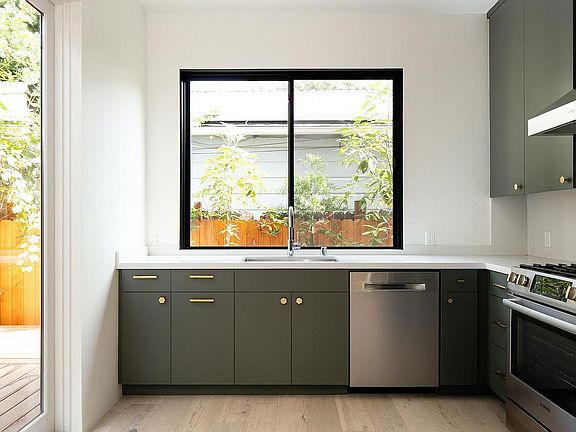 Kitchen with great window views and stainless steel apliances at 633 Palms Blvd. apartments in Venice, California.