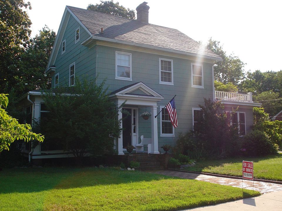 Morning sun peaking over this lovely home. 