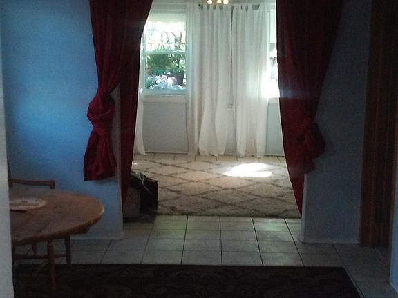 Front room and dining room view.