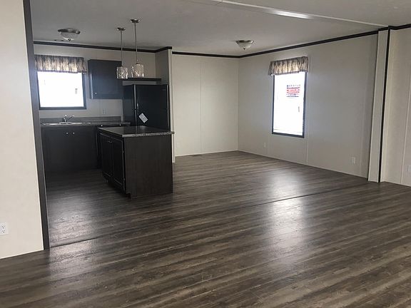 Front door walking into living room/kitchen area