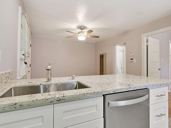 Peninsula with new dishwasher, since, counters and cabinets