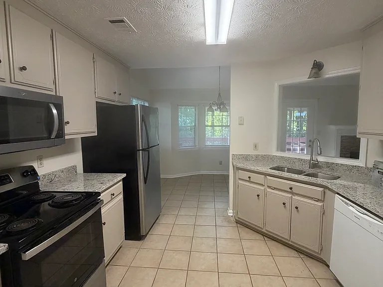 Large kitchen with updated granite countertops