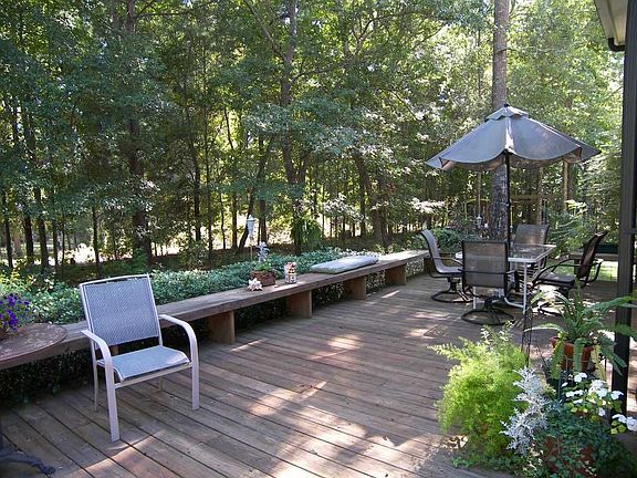 Custom Deck overlooks wooded yard