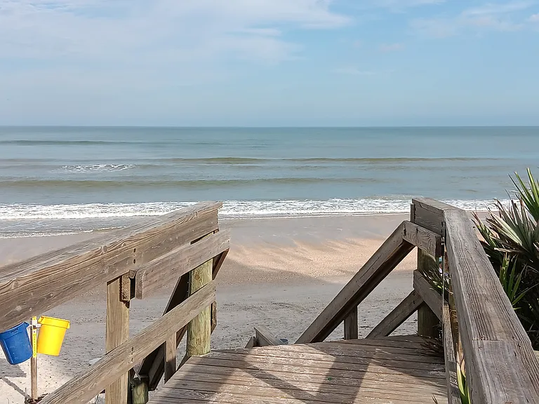 Fabulous boardwalk down to the beach. Hose and rinse area station for ocean walk guests.