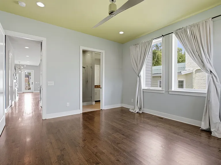 View from the master bedroom in the ensuite bathroom and down the hallway