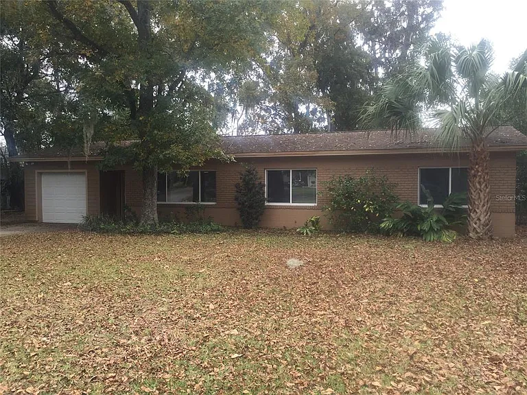 3423 NW 1st Ct — Photo 1