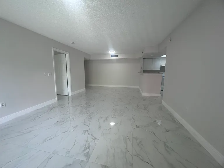 5011 Wiles Rd #207 — Photo 15