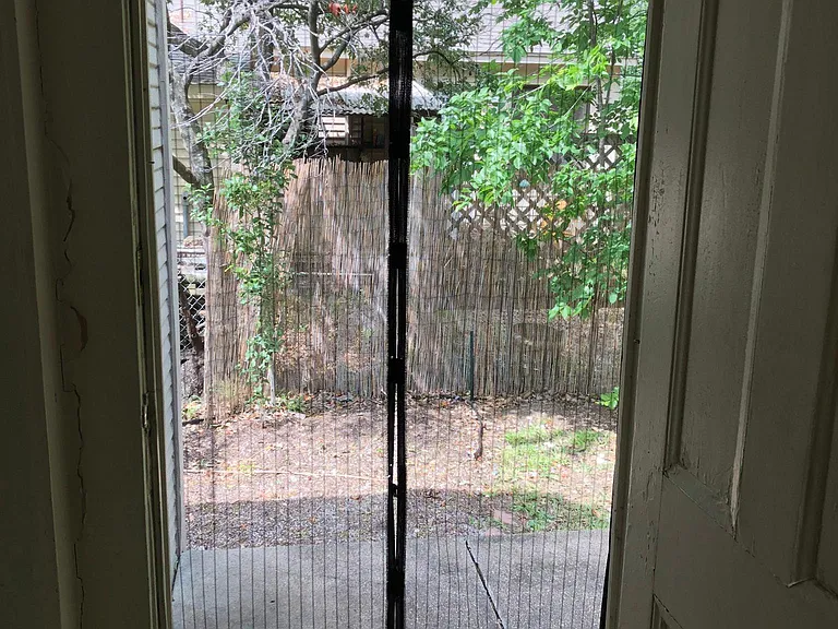 Back door to patio with mosquito screen