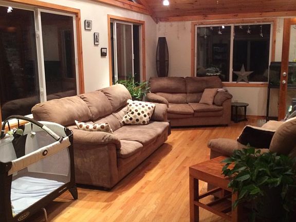 Sunroom with soaring ceiling