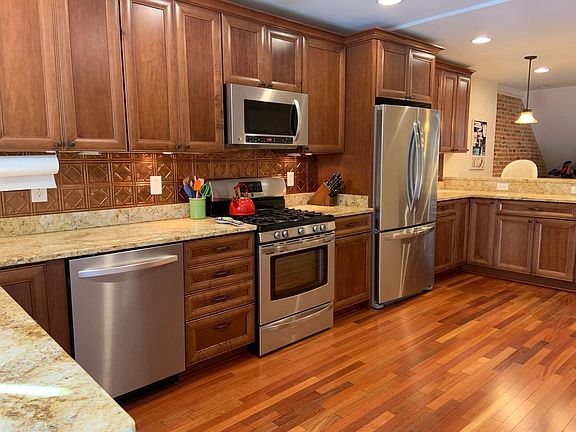 One of the largest kitchens you'll find in a house this size! Lots of natural light throughout.